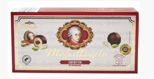 Цукерки марципанові з фісташкою в чорному шоколаді Chateau Mozartkugeln 200г Німеччина 6058 фото